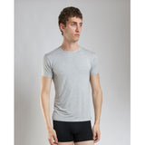 Detail view of crew neck stitching on SilkCut t-shirt showing smooth seams and durability