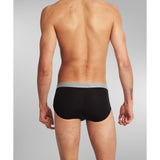 SilkCut Micro Modal hip brief shown under dress pants for sleek profile