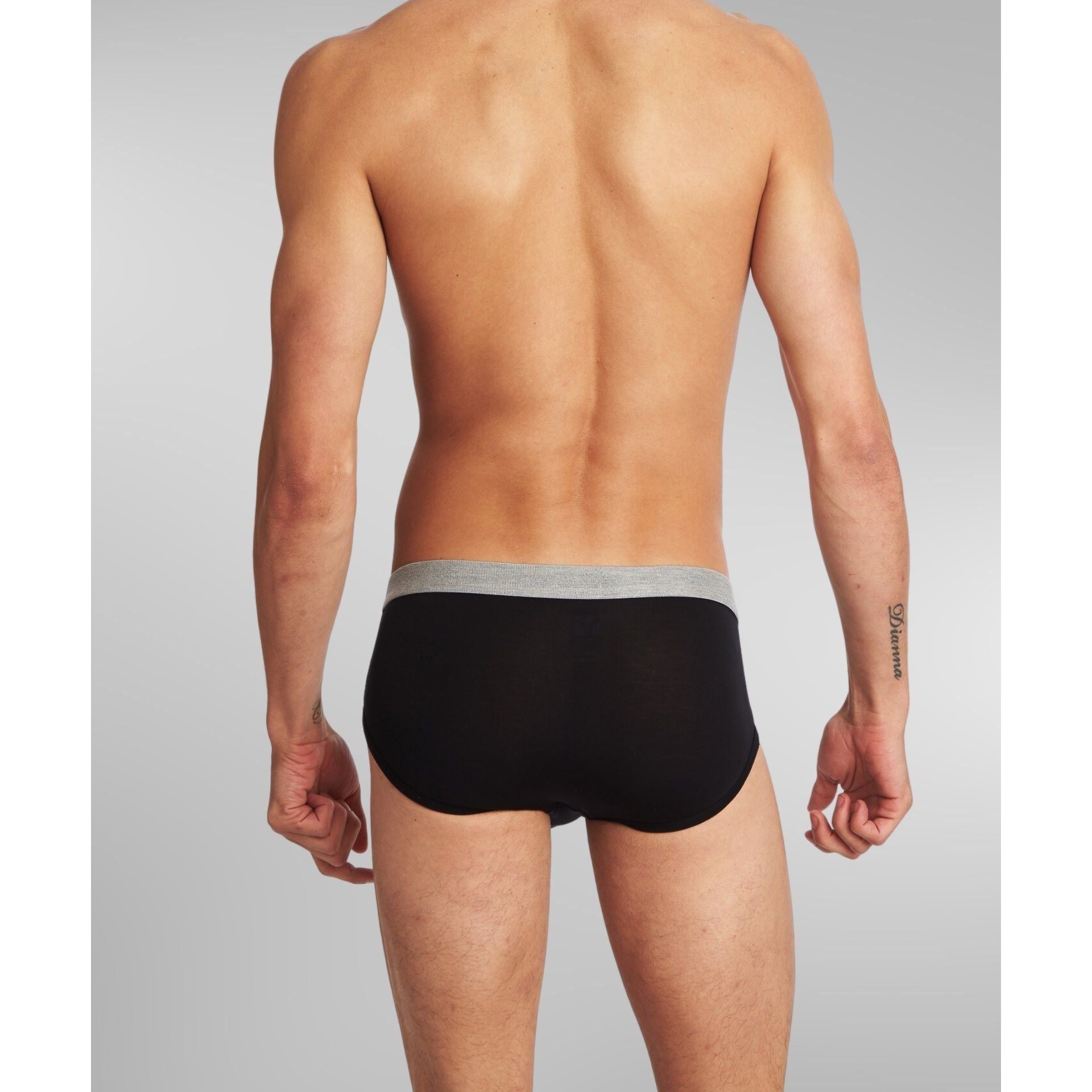 SilkCut Micro Modal hip brief shown under dress pants for sleek profile