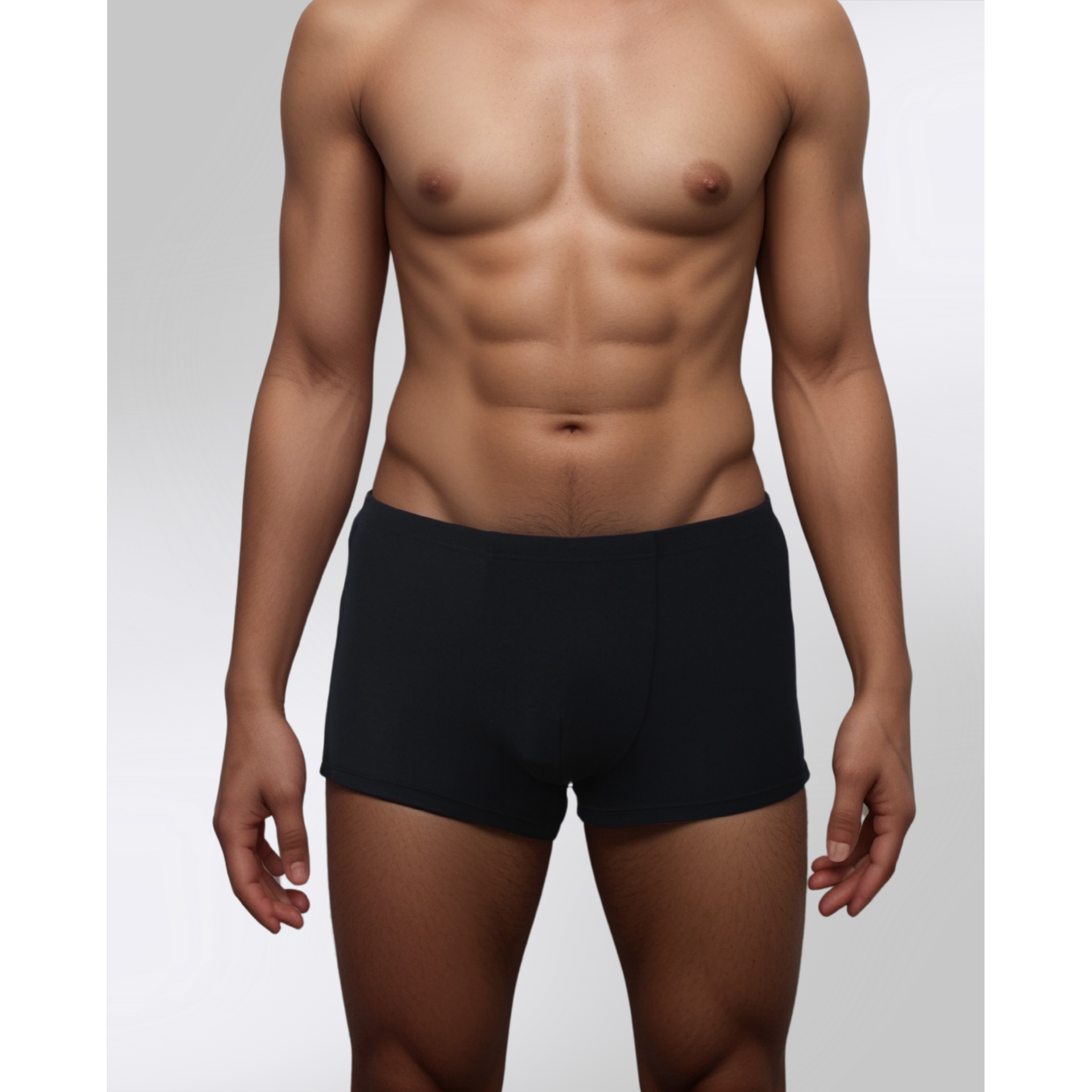Front view of SilkCut black trunks on male model – no-roll waistband and breathable fabric