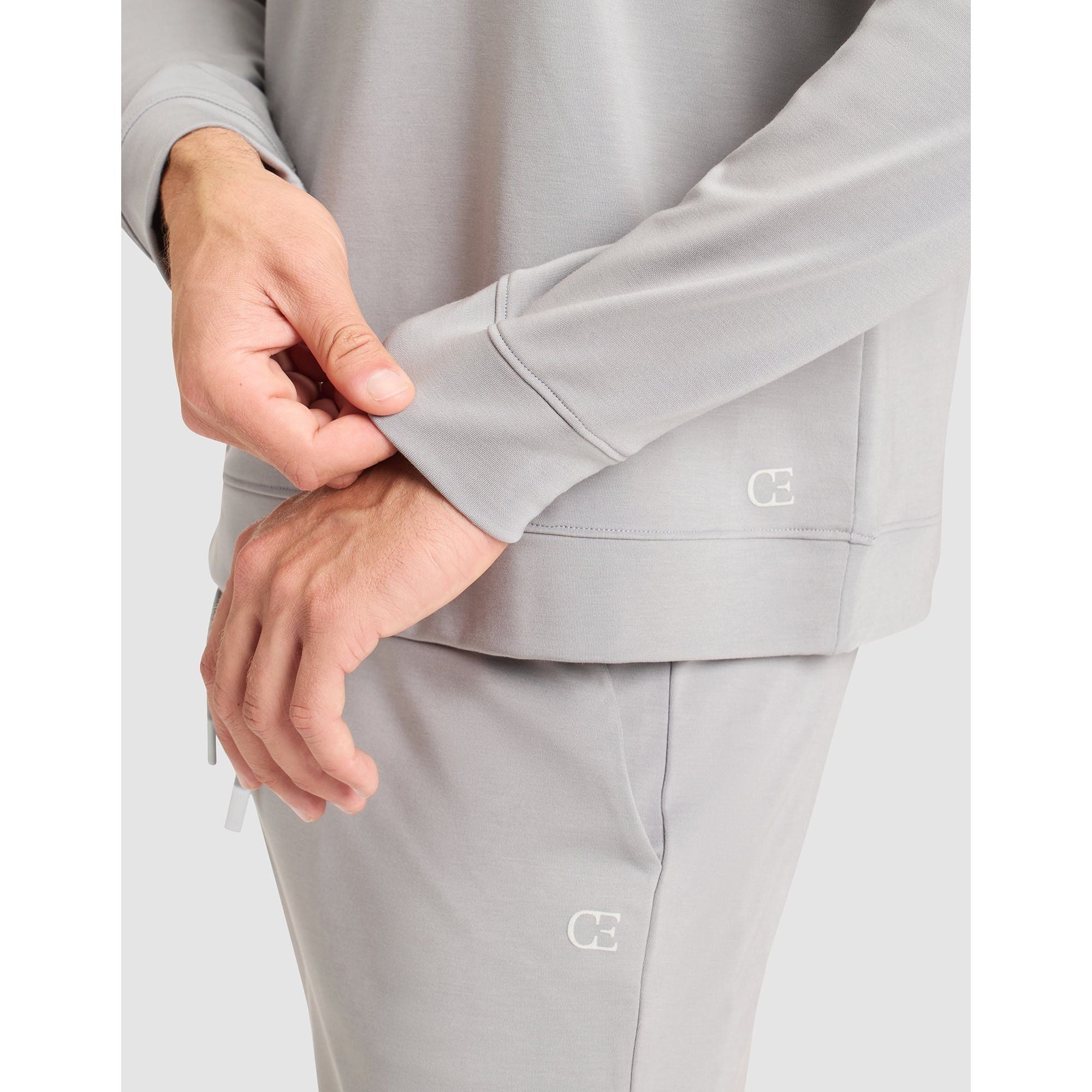 Gray pants with a logo on a white background