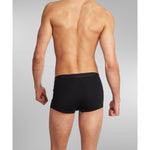 Man relaxing at home wearing SilkCut Sea Island Cotton Trunks – effortless everyday comfort