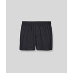 Black silk boxer shorts flat lay on gray background