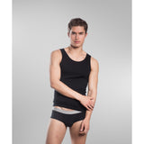 Side view of SilkCut men’s tank top highlighting shoulder fit and sleek drape
