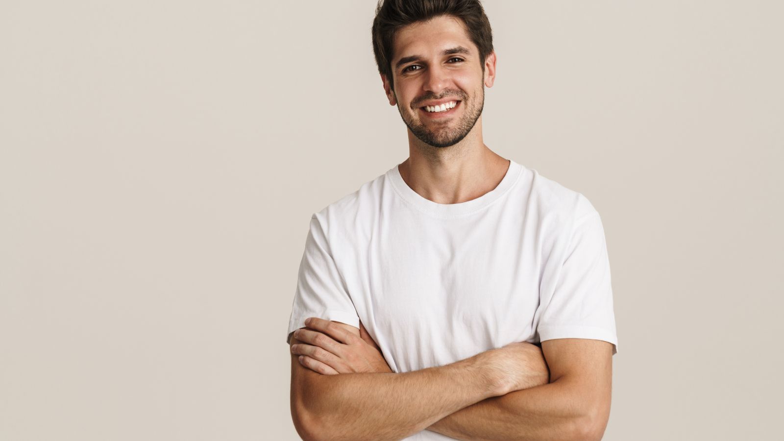 Man smiling after reading the SilkCut sleep comfort guide about wearing underwear under pyjamas