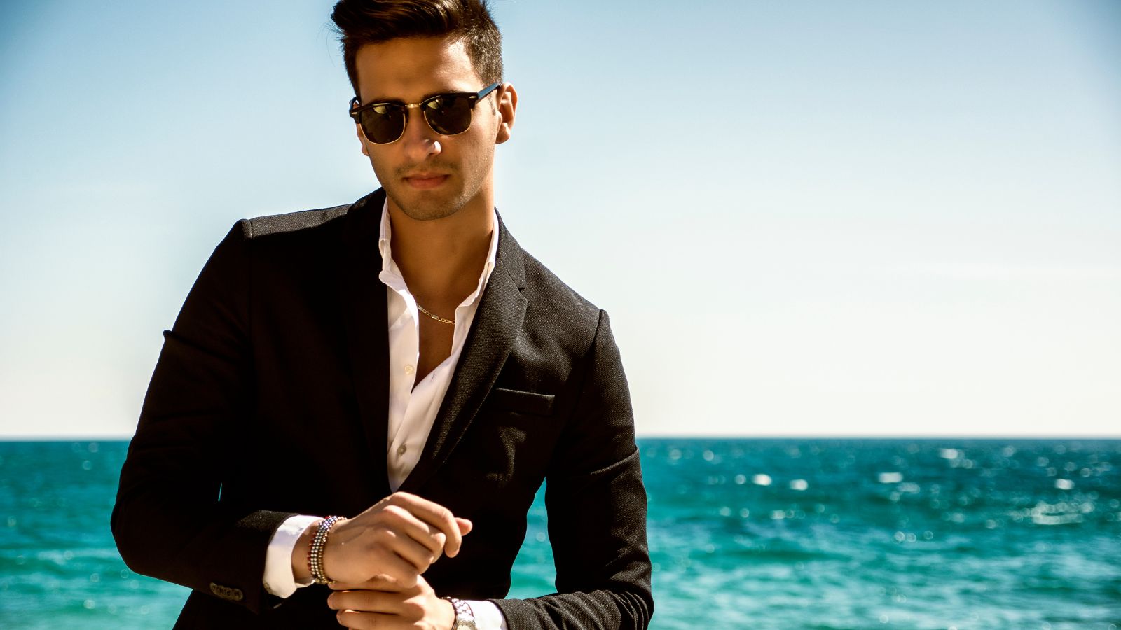a man folding SilkCut underwear on a dresser with natural lighting