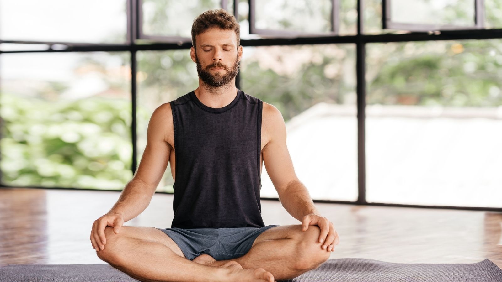 Man wearing breathable underwear practicing wellness and hygiene habits for everyday comfort