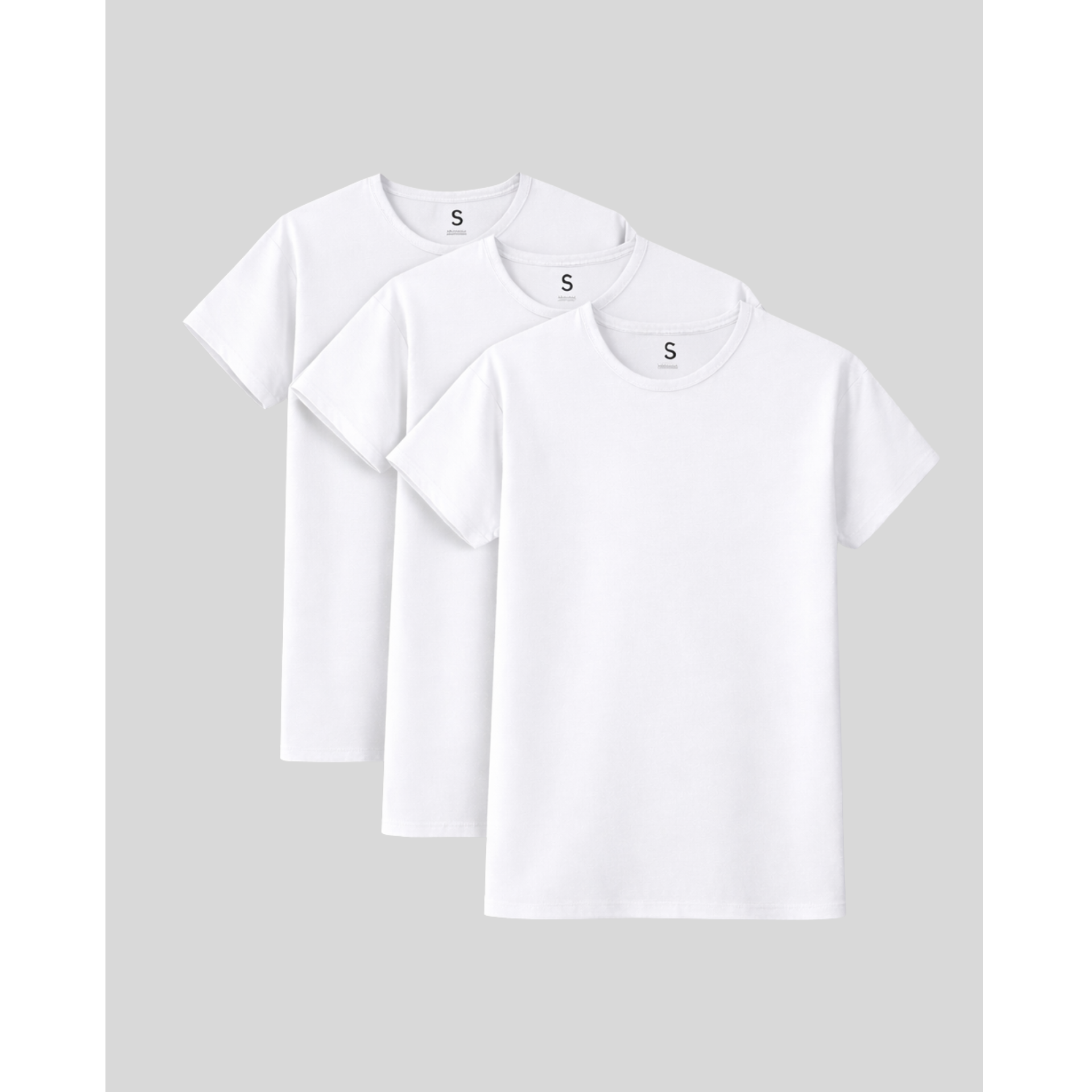 Three white t-shirts stacked on a light gray background