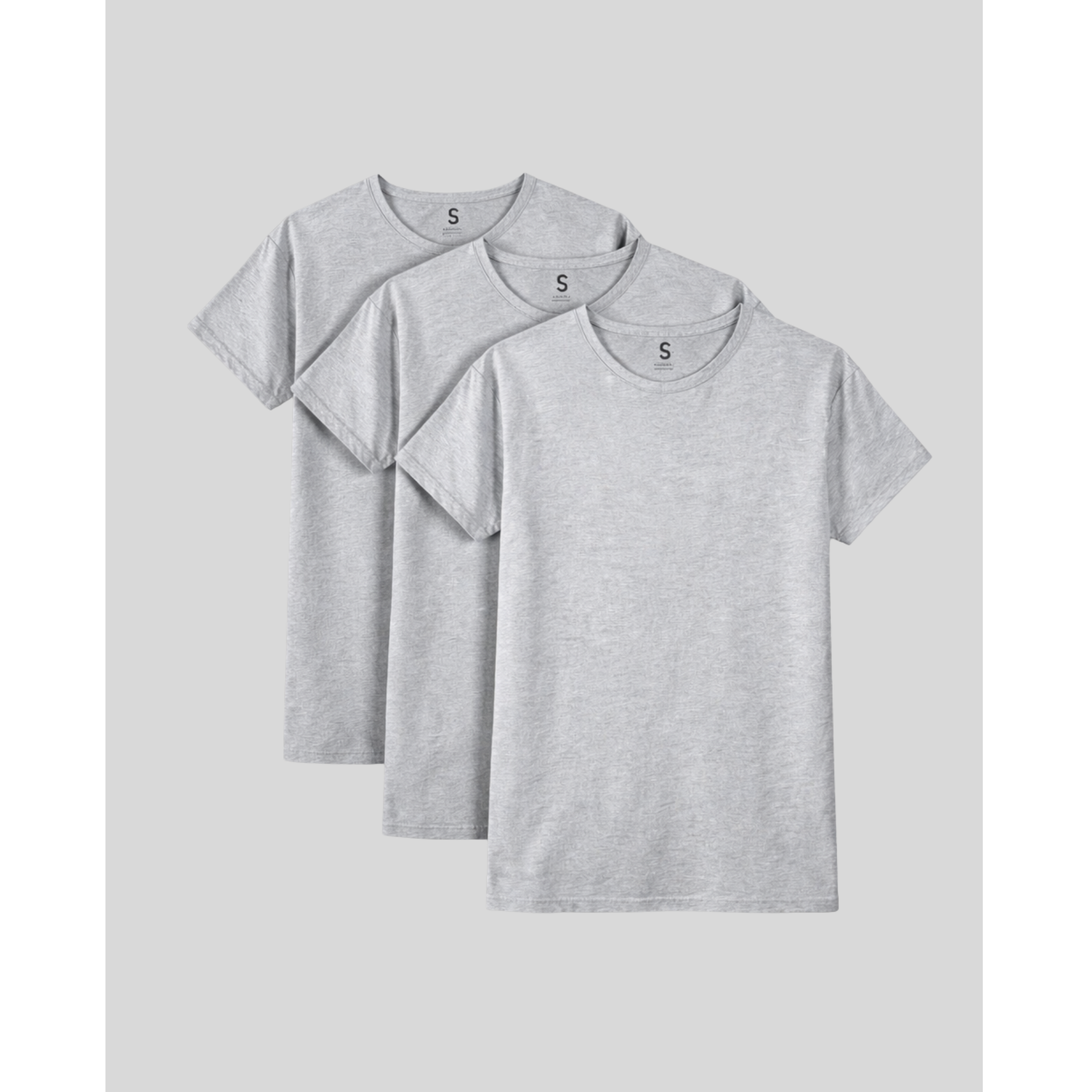 Three gray t-shirts stacked on a light gray background
