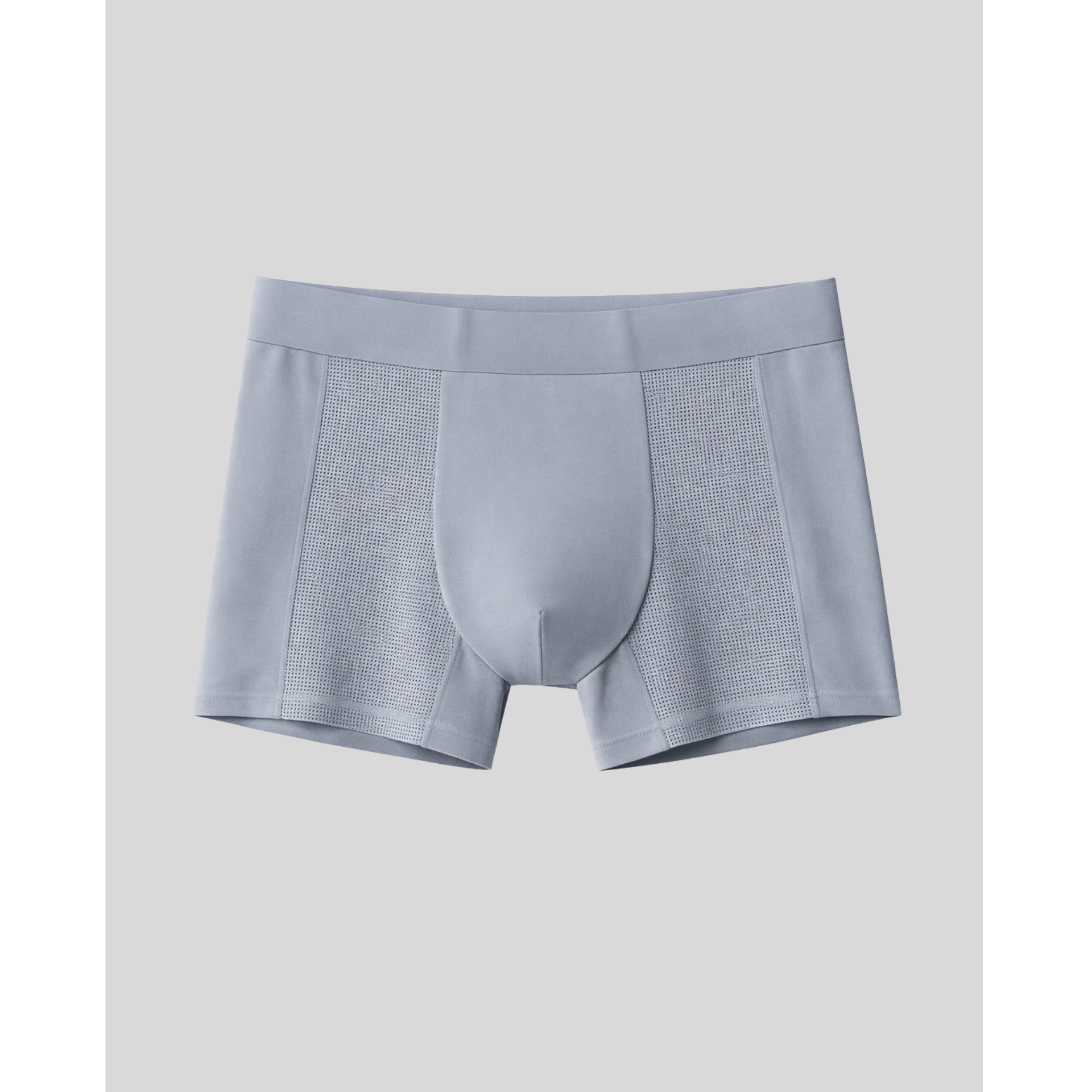 Gray boxer briefs with mesh panels on a light gray background