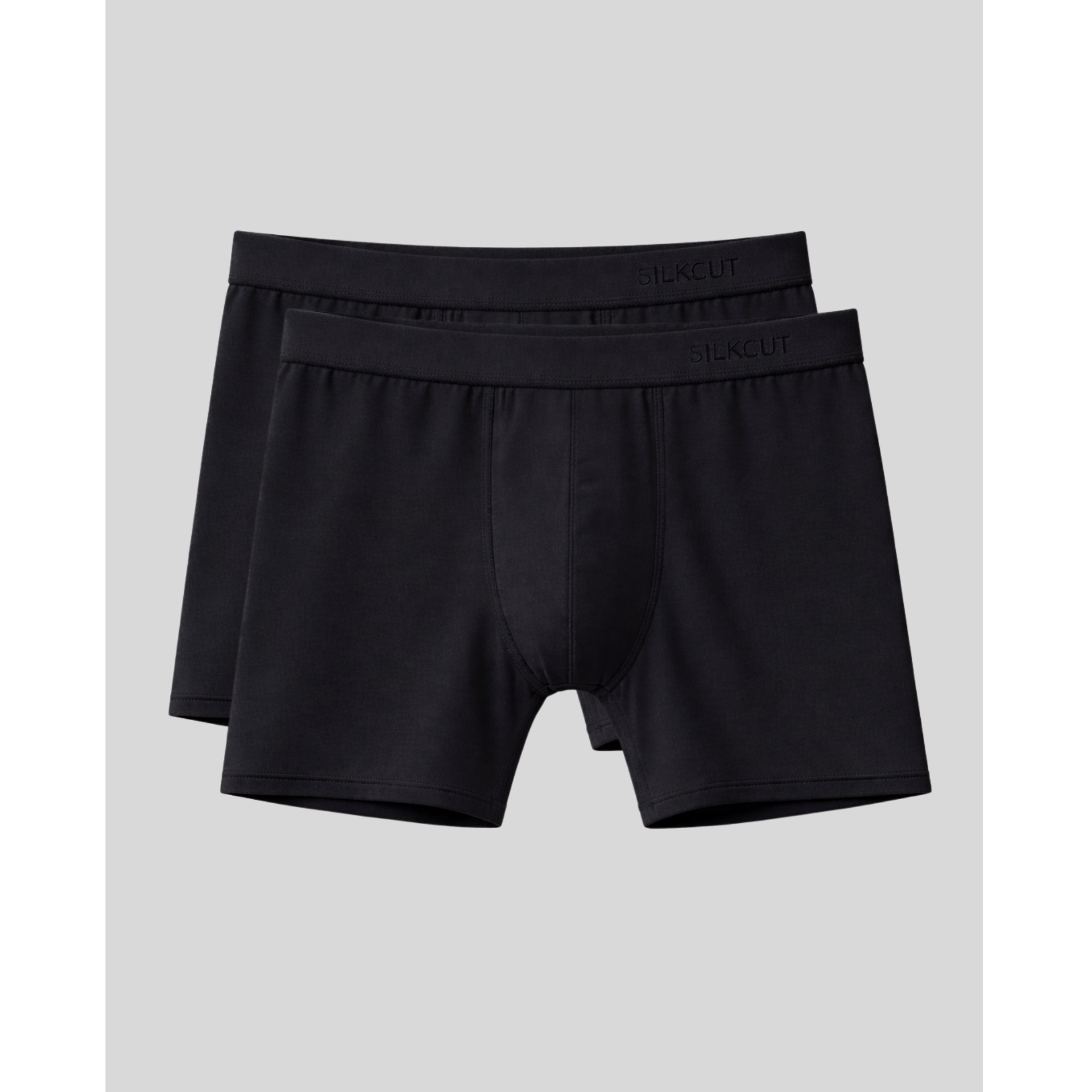 Two black boxer briefs with a silk cut brand logo on a light gray background