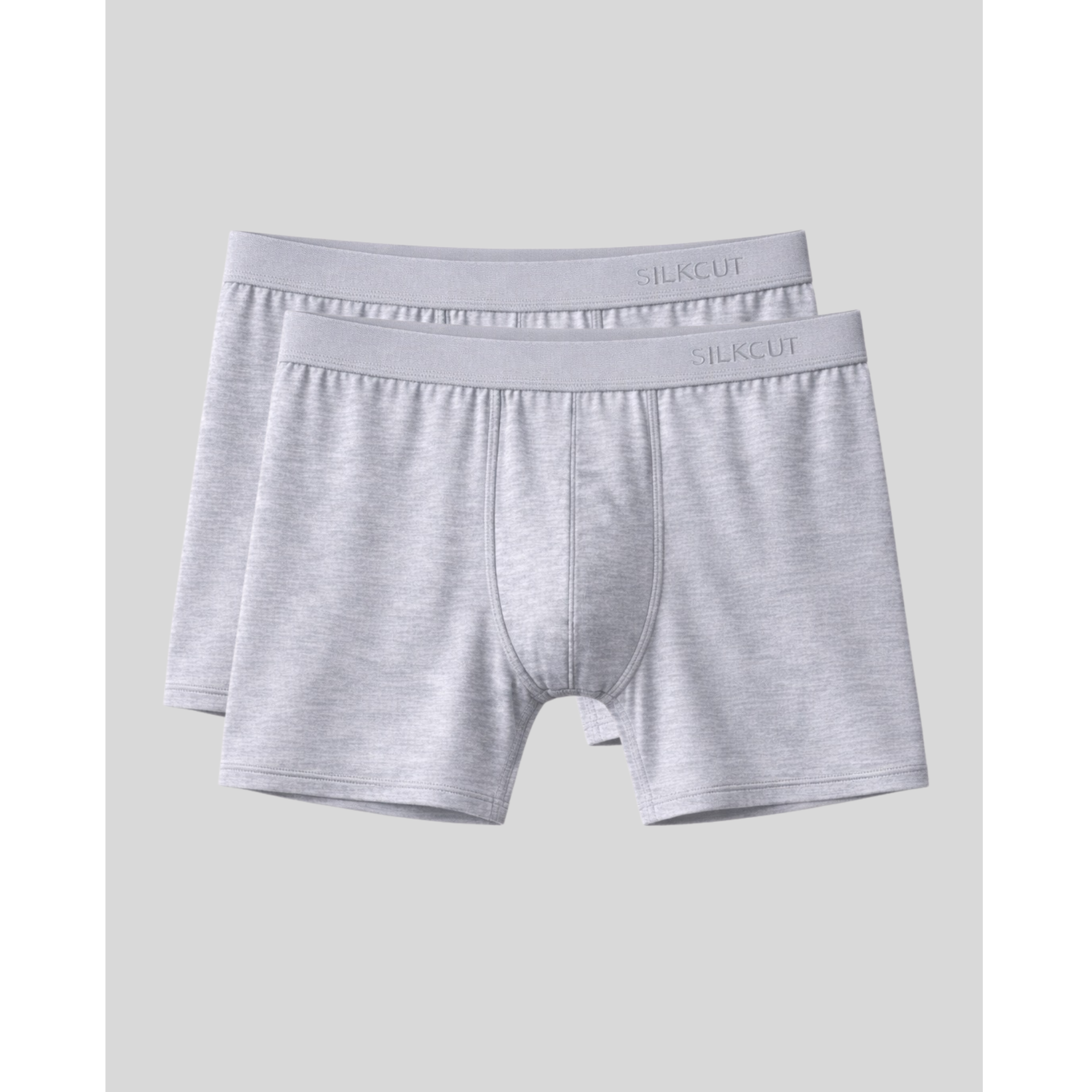 Two pairs of gray micro modal boxer briefs with 'SilkCut' branding on a light gray background.