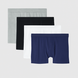 Set of four men's underwear boxes in gray, black, white, and navy on a light gray background.