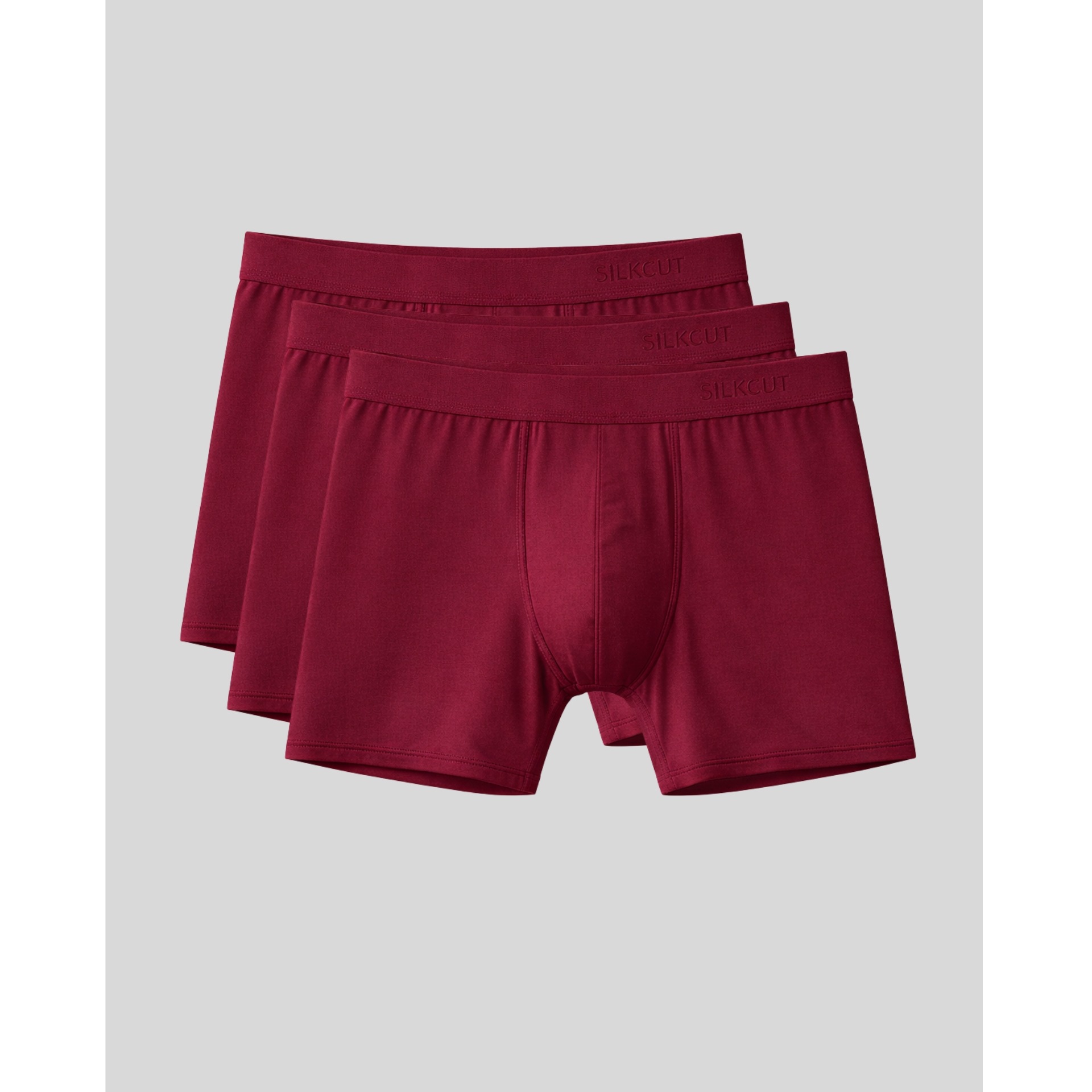 Three pack Silkcut underwear bundle 3 pairs of maroon boxer briefs on a light gray background