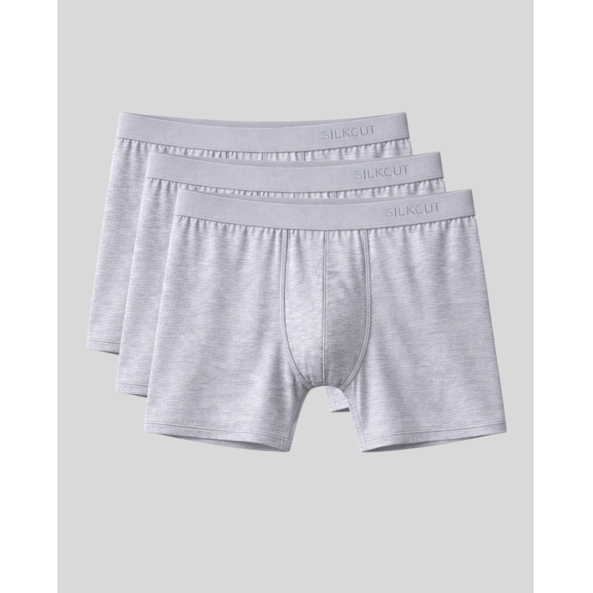 Three pairs of gray modal boxer briefs on a light gray background