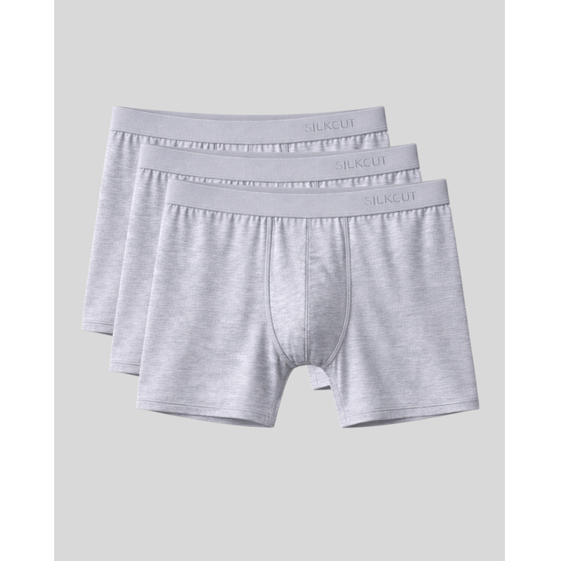 Three pairs of gray silkcut micro modal air modal boxer briefs on a light gray background