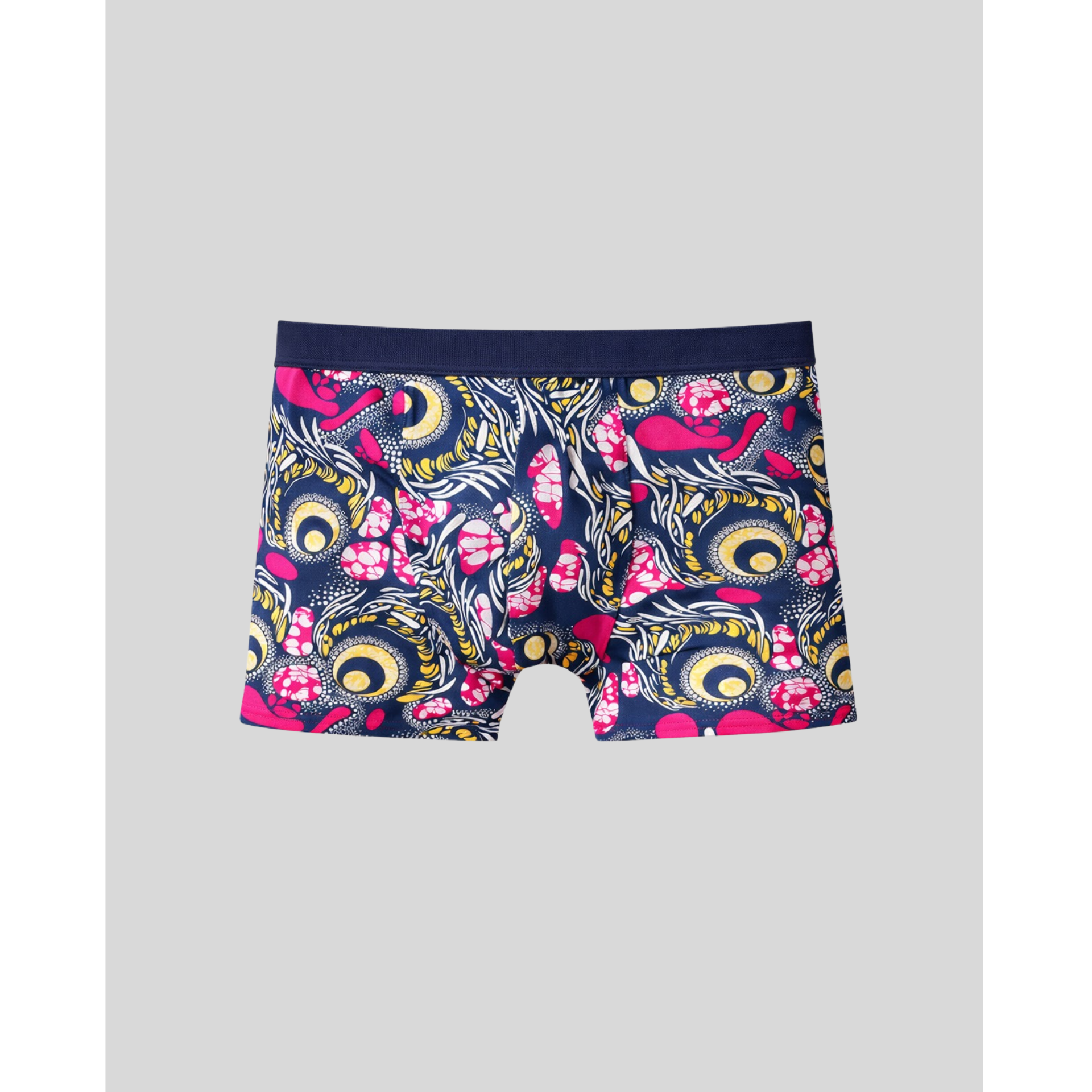 Navy boxer briefs with pink and yellow floral and peacock pattern on a light gray background