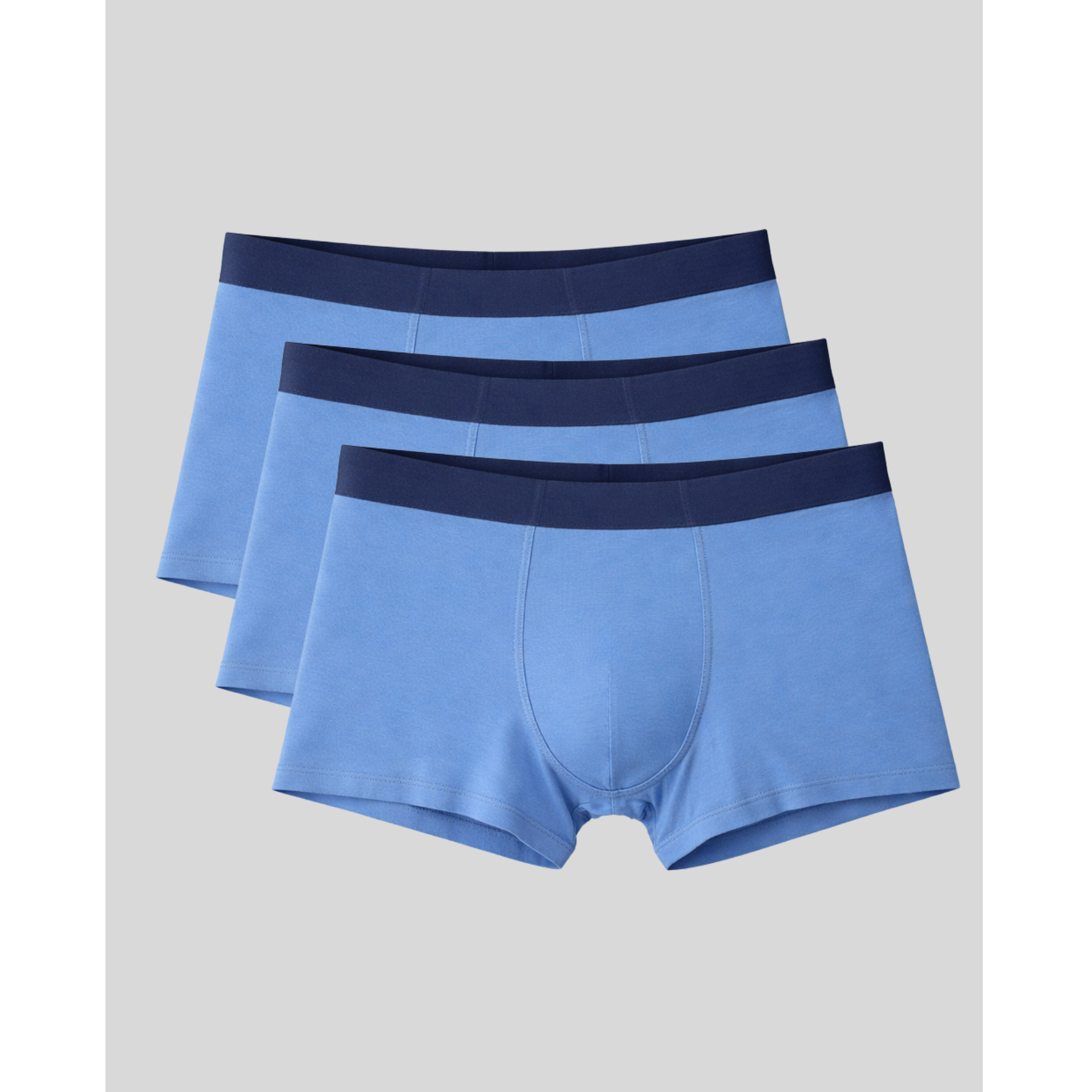 Three pairs of blue boxer briefs with navy waistbands that feature a molded ergonomic pouch without a fly for a smooth, streamlined fit.