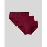 Three pairs of maroon underwear on a light gray background