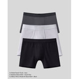 Three pairs of men's underwear in black, gray, and cloud gray on a light gray background.