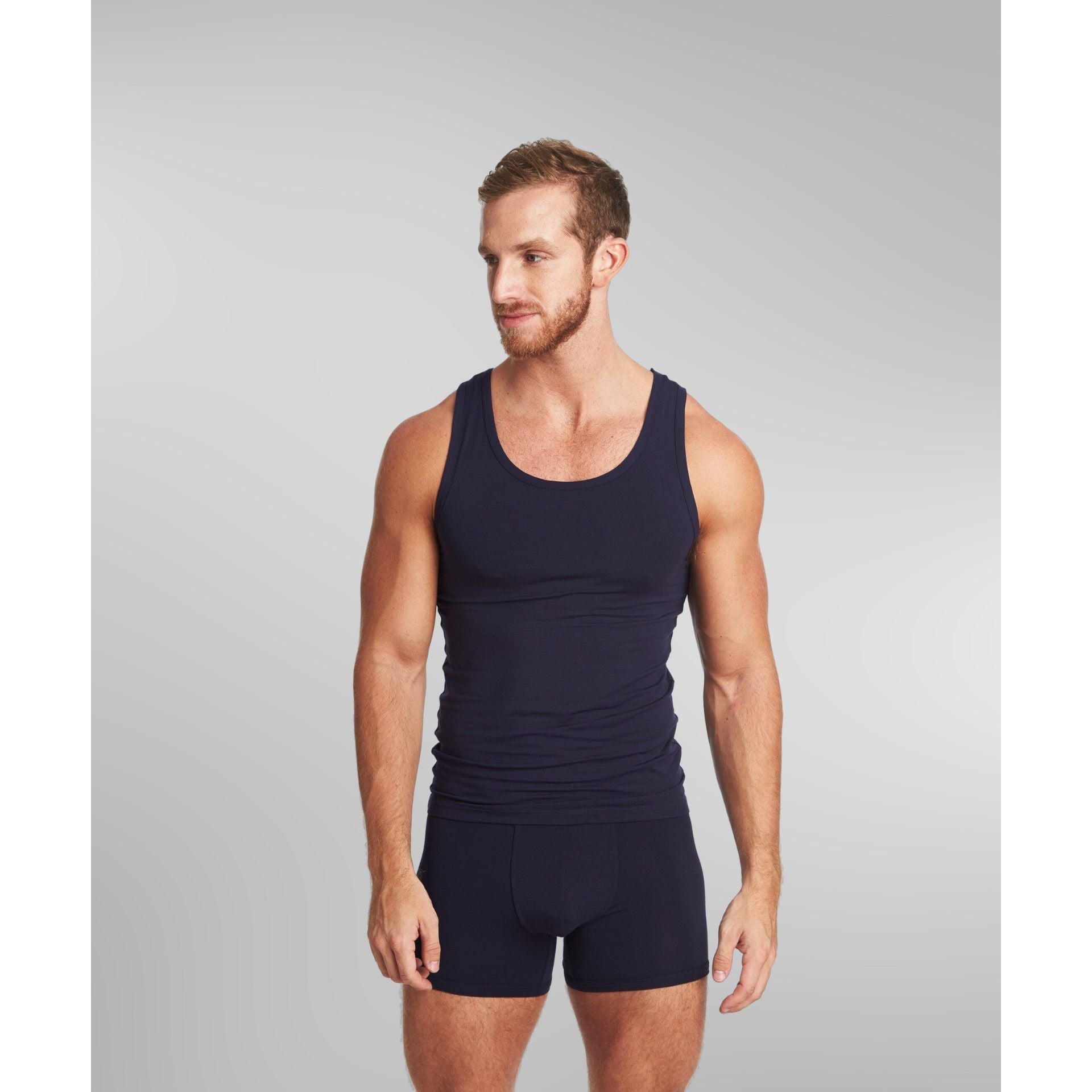 Lifestyle shot of SilkCut men’s tank top symbolizing modern comfort and performance