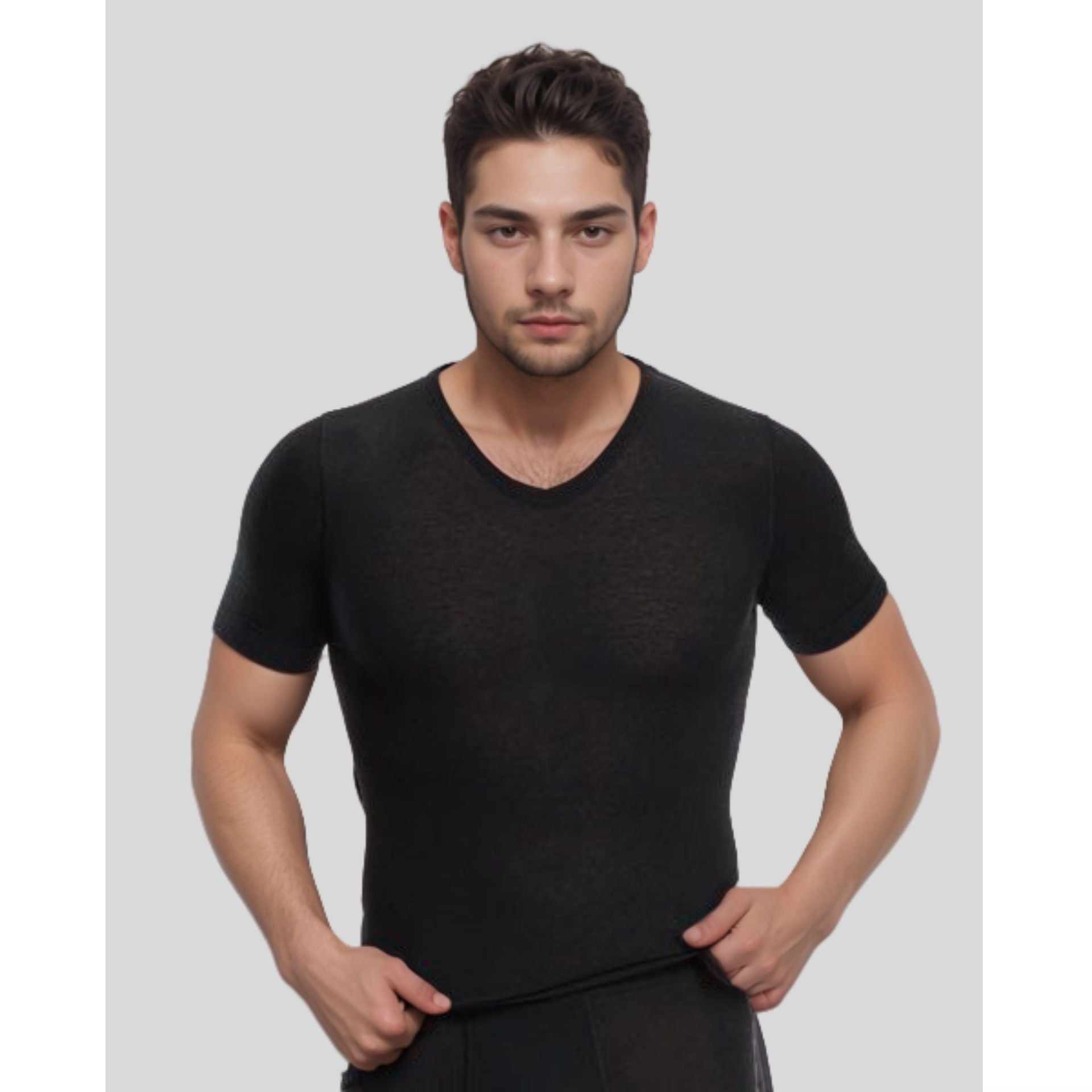 Man wearing a black t-shirt against a plain background
