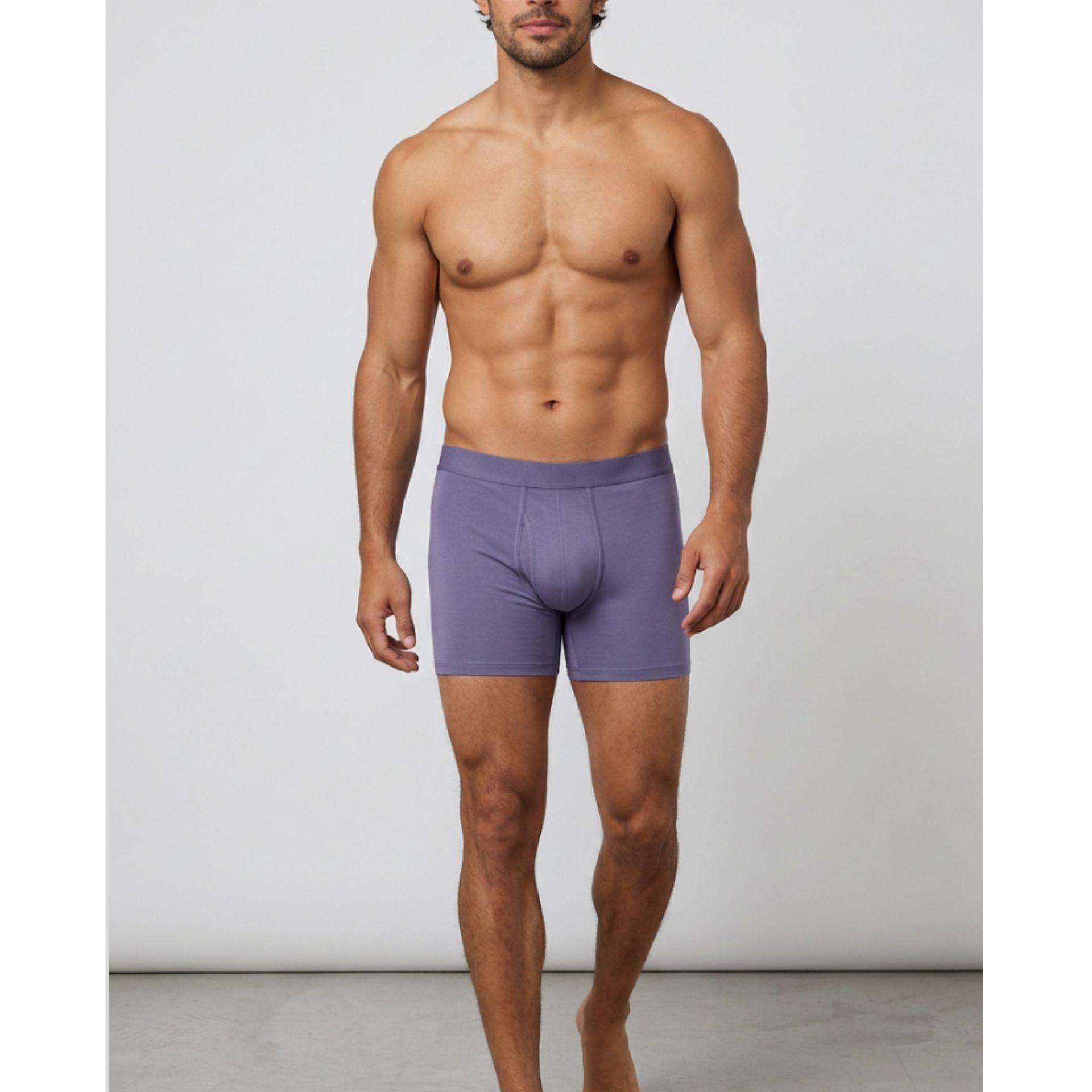 Man wearing a purple underwear on a plain background silkcut underwear