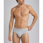 A shirtless male model wearing light gray heathered briefs, shown from the waist up against a plain light gray studio background. silkcut underwear