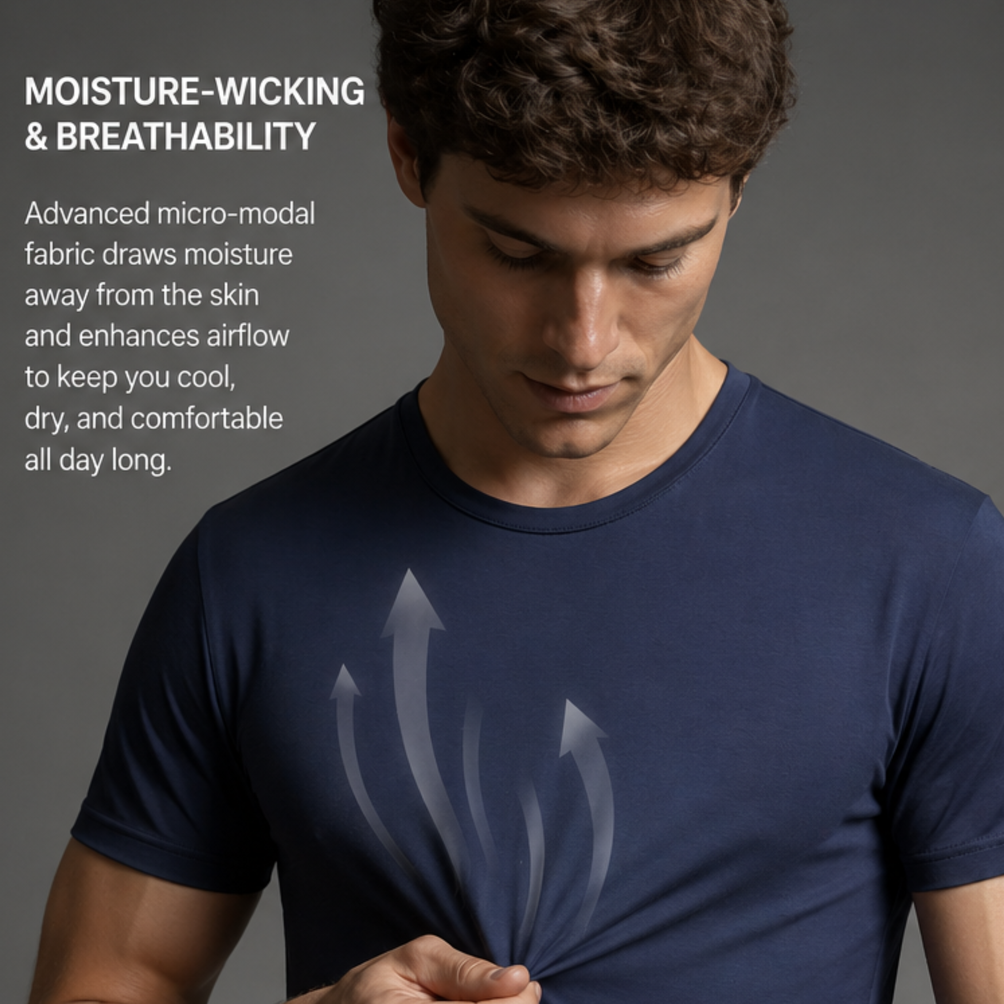 A man wearing a navy micro modal air silkcut underwear  blue t-shirt with a graphic of rising airflow arrows on the chest, set against a dark gray background with text highlighting moisture-wicking and breathability.